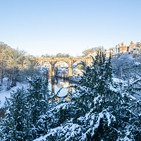 Buy canvas prints of Winter snow sunrise over the river Nidd in Knaresborough, North Yorkshire. vertical Panoramic format. by mike morley