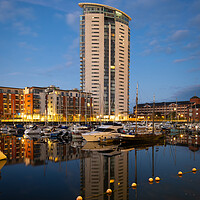 Buy canvas prints of The Meridian tower at Swansea marina  by Bryn Morgan