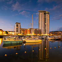 Buy canvas prints of The Meridian tower at Swansea marina by Bryn Morgan