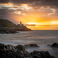 Buy canvas prints of Sunrise at Mumbles lighthouse by Bryn Morgan