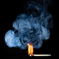 Buy canvas prints of Burning match with smoke and flames by Bryn Morgan