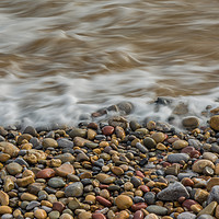 Buy canvas prints of Pebbles on the beach. by Bryn Morgan