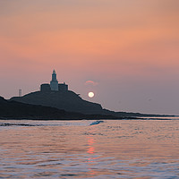 Buy canvas prints of Sunrise at Mumbles lighthouse. by Bryn Morgan