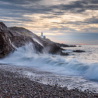 Buy canvas prints of Mumbles lighthouse at sunrise. by Bryn Morgan