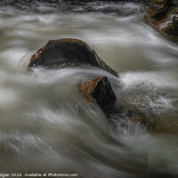 Buy canvas prints of Boulder with flowing water by Bryn Morgan