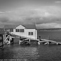 Buy canvas prints of The old lifeboat house at Mumbles pier, black and white by Bryn Morgan