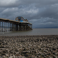 Buy canvas prints of Mumbles pier at low tide by Bryn Morgan