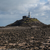 Buy canvas prints of Mumbles lighthouse at low tide by Bryn Morgan
