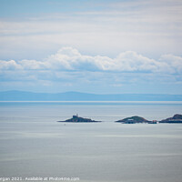 Buy canvas prints of Mumbles lighthouse and pier viewed from Pantycelyn Road by Bryn Morgan