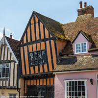 Buy canvas prints of The Crooked House in Lavenham, Suffolk by Chris Dorney