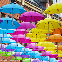 Buy canvas prints of Hanging Umbrellas in Durham, UK by Chris Dorney