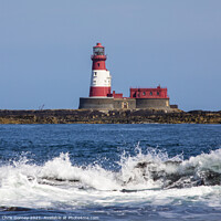 Buy canvas prints of Longstone Lighthouse on the Farne Islands in the UK by Chris Dorney