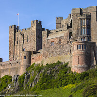 Buy canvas prints of Bamburgh Castle in Northumberland, UK by Chris Dorney