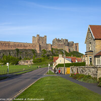 Buy canvas prints of Bamburgh Castle in Bamburgh, Northumberland, UK by Chris Dorney