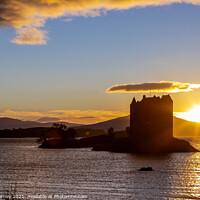 Buy canvas prints of Sunset at Castle Stalker in the Scottish Highlands by Chris Dorney