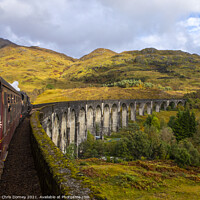Buy canvas prints of Jacobite Express Steam Train on the Glenfinnan Viaduct by Chris Dorney