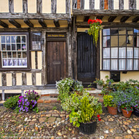 Buy canvas prints of Timber-Framed Cottages in Thaxted, Essex by Chris Dorney