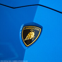 Buy canvas prints of Lamborghini Badge on a Car by Chris Dorney