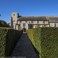Buy canvas prints of All Saints Church in Thornham, Norfolk, UK by Chris Dorney