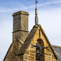 Buy canvas prints of The Curfew Tower in Moreton-in-Marsh, the Cotswolds, UK by Chris Dorney
