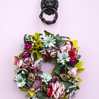 Buy canvas prints of Wreath on a Pink Door by Chris Dorney