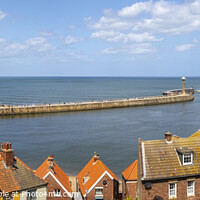Buy canvas prints of Lighthouses at Whitby Harbour in Whitby, North Yorkshire by Chris Dorney