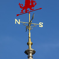 Buy canvas prints of Red Dragon Weather Vane on Llandudno Pier in Wales by Chris Dorney