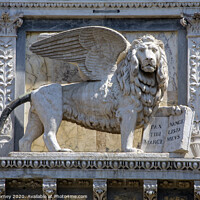 Buy canvas prints of Lion of Venice Sculpture on Scuola Grande di San Marco by Chris Dorney