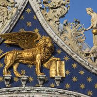 Buy canvas prints of Sculpture of the Lion of Venice on St. Marks Basilica by Chris Dorney