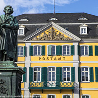 Buy canvas prints of Beethoven Statue and Old Post Office Building in Bonn, Germany by Chris Dorney