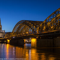 Buy canvas prints of Cologne Cathedral and the Hohenzollern Bridge  by Chris Dorney