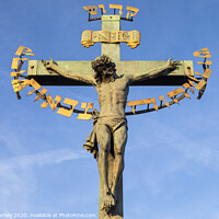 Buy canvas prints of Crucifix on the Chales Bridge in Prague by Chris Dorney