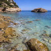 Buy canvas prints of Ambolo Beach in Javea by Chris Dorney