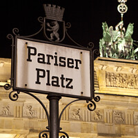 Buy canvas prints of Pariser Platz Street Sign and the Brandenburg Gate by Chris Dorney