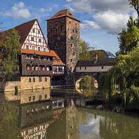 Buy canvas prints of Weinstadel House and Henkersteg in Nuremberg by Chris Dorney