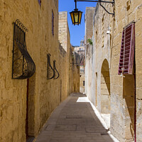 Buy canvas prints of Narrow Streets in Mdina by Chris Dorney