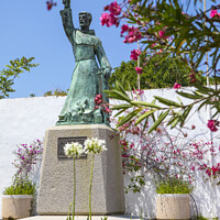 Buy canvas prints of Sao Vicente Statue in Albufeira by Chris Dorney