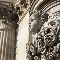 Buy canvas prints of Detailed Carvings on the Exterior of St. Pauls Cathedral in London by Chris Dorney