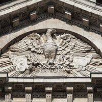 Buy canvas prints of Phoenix Sculpture on the facade of St. Pauls Cathedral by Chris Dorney