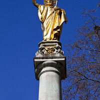 Buy canvas prints of Saint Paul Statue at St. Pauls Cathedral in London by Chris Dorney