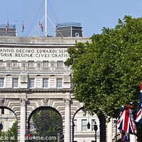 Buy canvas prints of Admiralty Arch and Union Flags in London by Chris Dorney