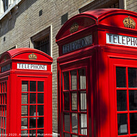 Buy canvas prints of Red Telephone Boxes in London by Chris Dorney