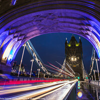 Buy canvas prints of Light Trails on Tower Bridge in London by Chris Dorney