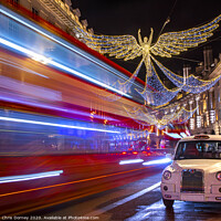 Buy canvas prints of Regent Street Christmas Lights in London by Chris Dorney