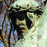 Buy canvas prints of A close up of a bronze figure of Christ by Adam Ransom