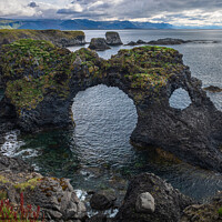 Buy canvas prints of Gatklettur Stone Arch Iceland by Graeme Taplin Landscape Photography