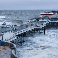 Buy canvas prints of Cromer Pier winter storm surge by Graeme Taplin Landscape Photography