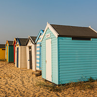 Buy canvas prints of Colourful beach huts on the sand at Southwold  by Graeme Taplin Landscape Photography