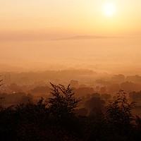 Buy canvas prints of                 Misty Sunrise over Bredon Hill     by John Iddles