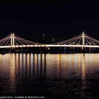 Buy canvas prints of Iconic Albert bridge at night, reflected in the River Thames by Milton Cogheil